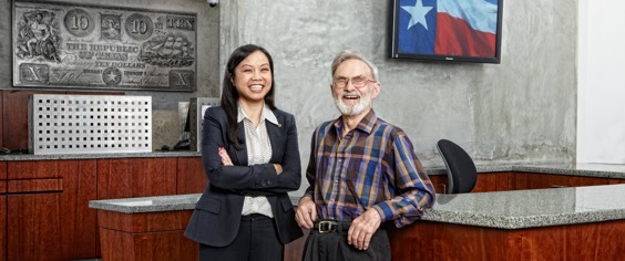 Image of two people smiling