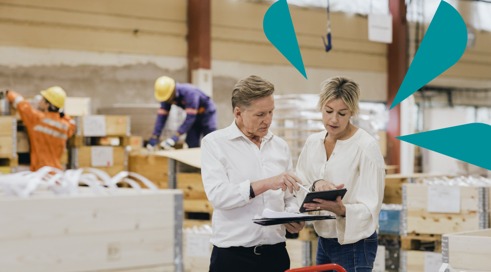 Photo of two people working