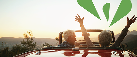 Image of two people in a convertible