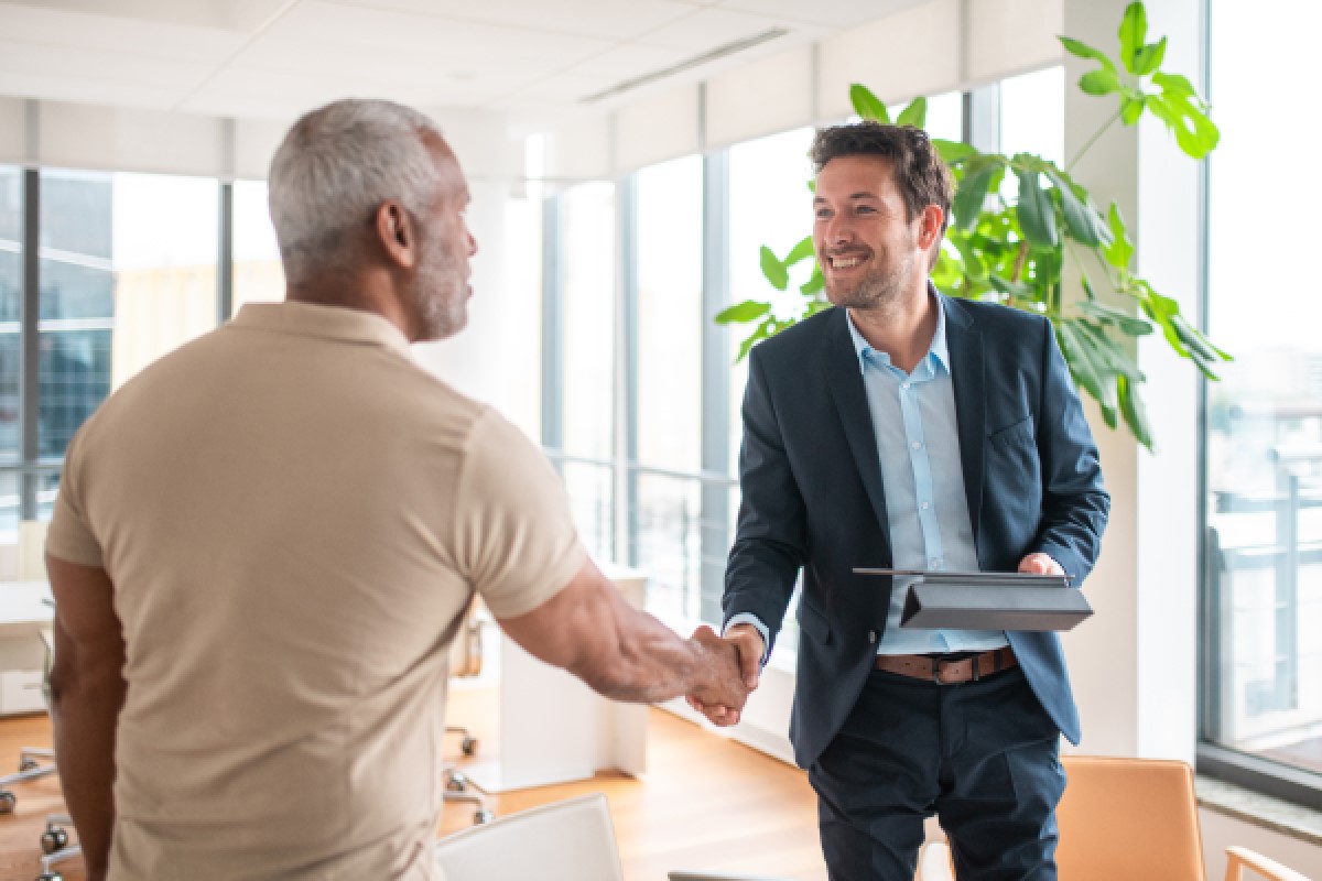 Image of men shaking hands