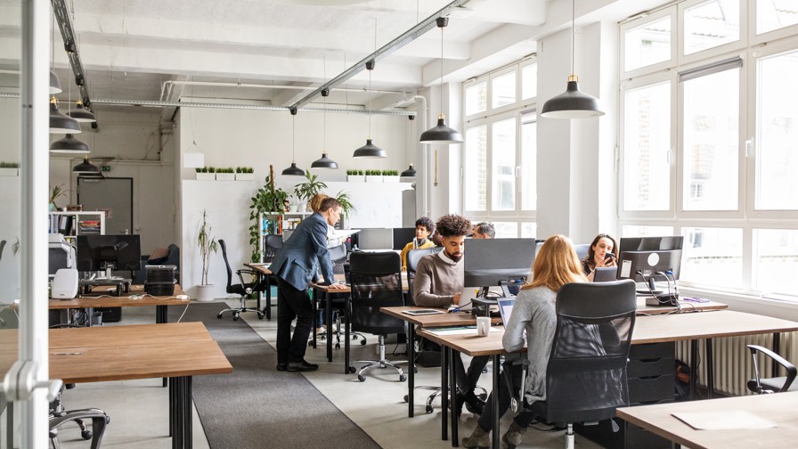 Image of people working in an office