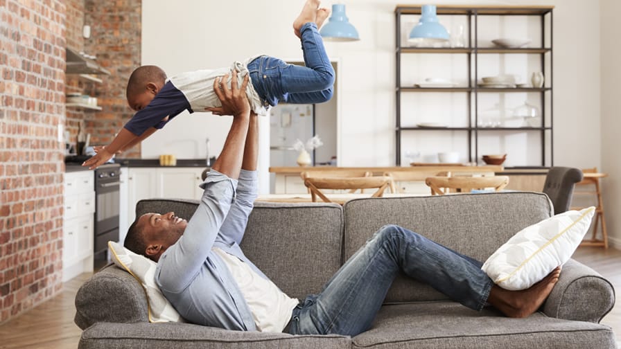 Man lifting kid