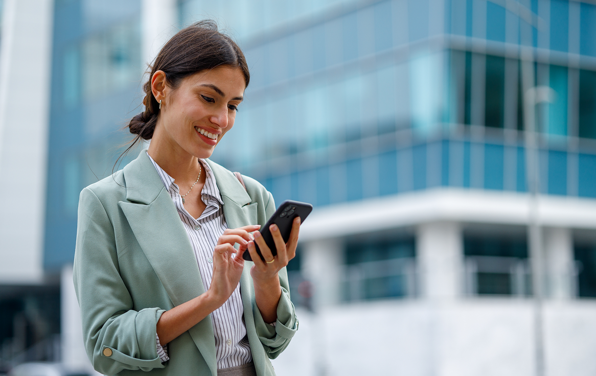 Image of woman on her mobile phone