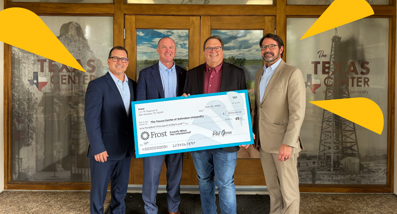 Image of group holding a donation check