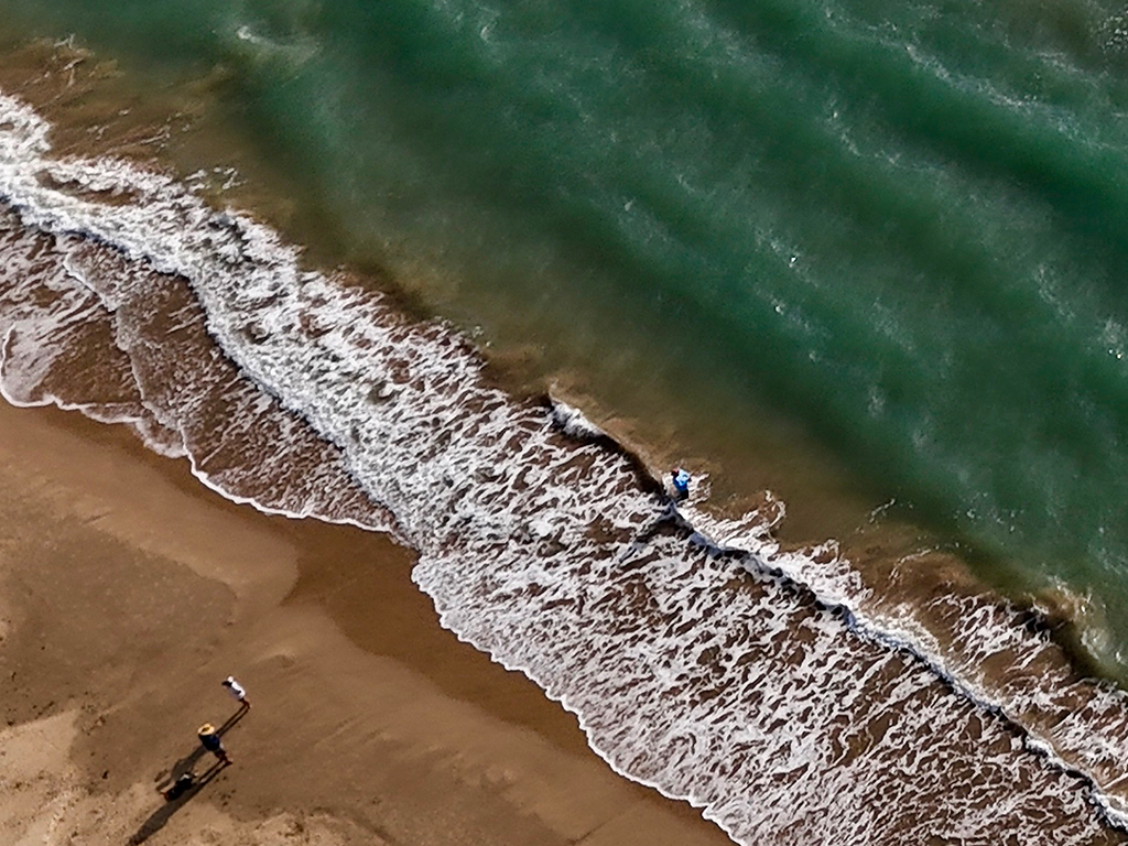 Morning Walk on the Beach 